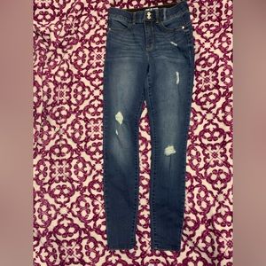 Dark Blue Skinny Ripped jeans. Size 5 in Juniors. (never worn)